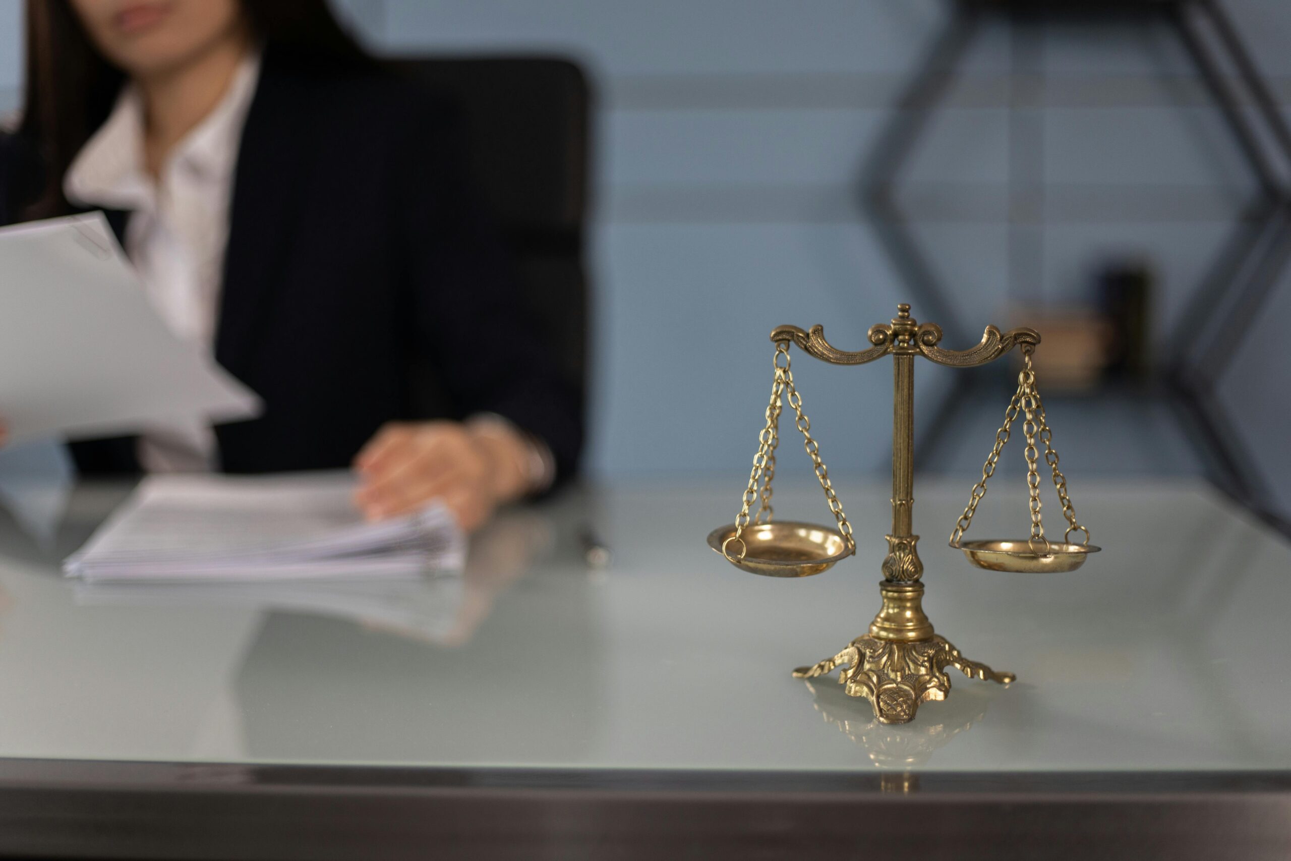 Lawyer reviewing legal documents on a desk