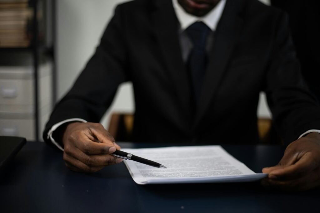 Founder reviewing legal documents before signing with advisor