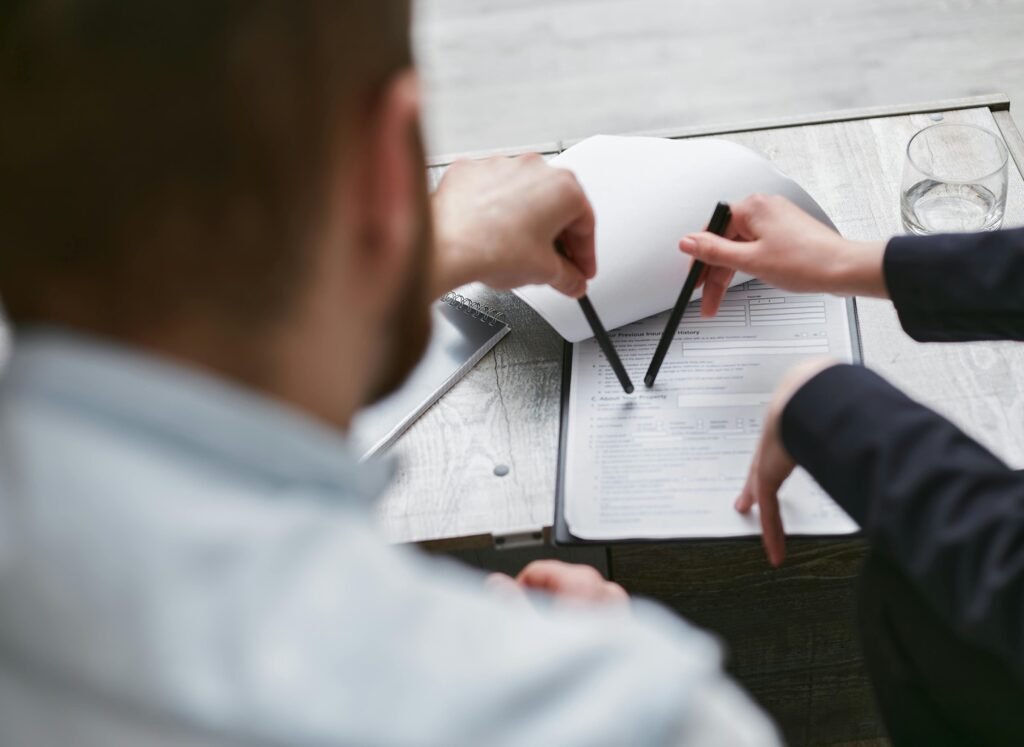 contract drafting UAE business partners reviewing agreement