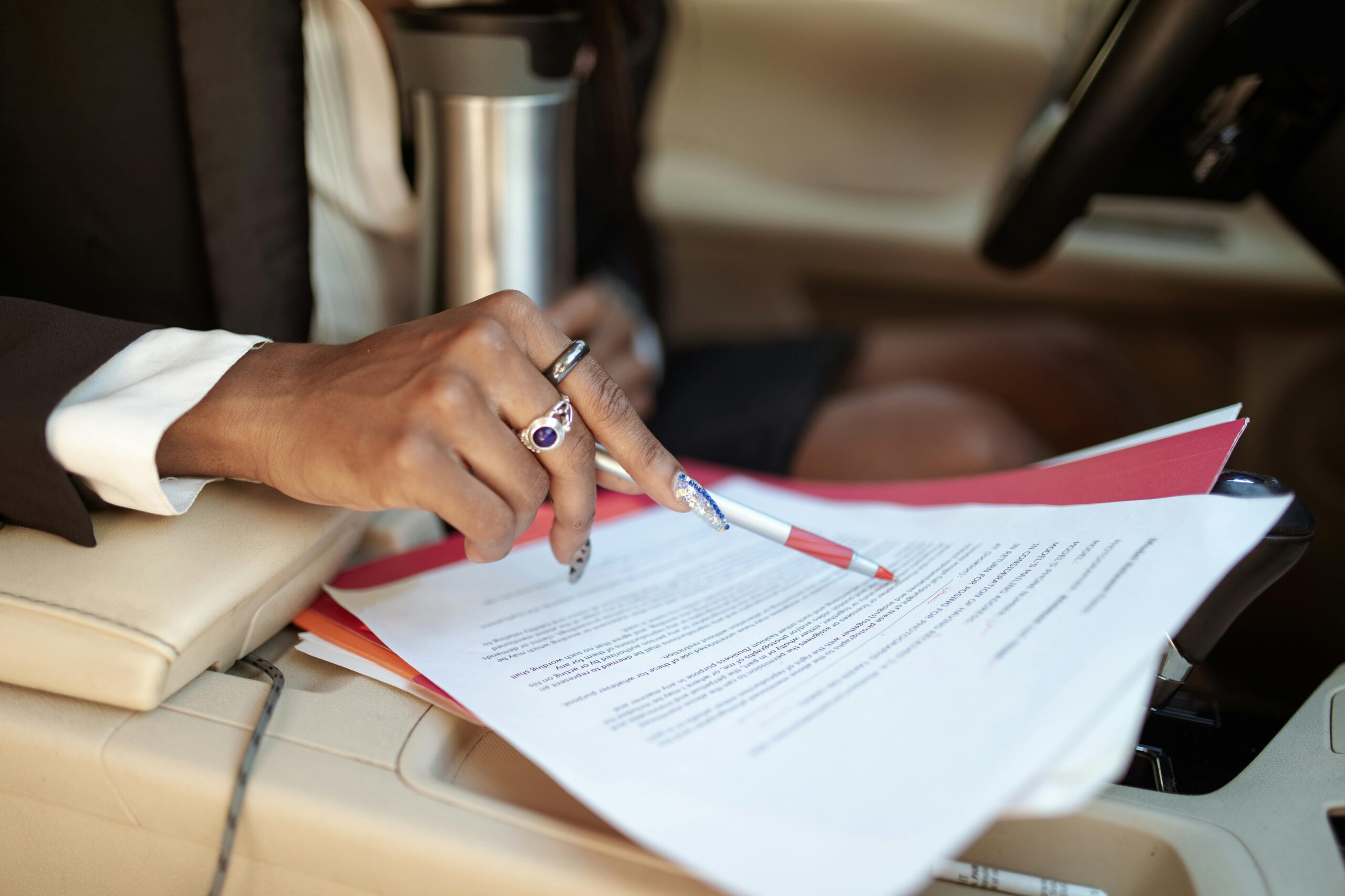 contract review UAE business owner reviewing agreement before signing